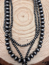 Load image into Gallery viewer, 3 Layered Necklace with Faux Turquoise Cross Pendant - 16, 18 and 26 inch

